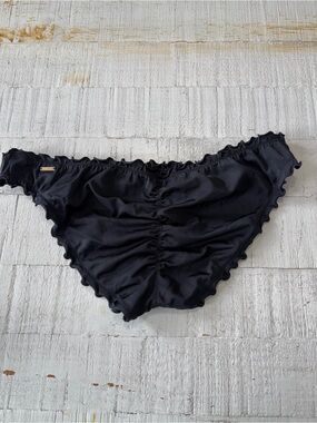 Victoria’s Secret size Medium the Ruffle Cheeky Bikini Bottom in Black